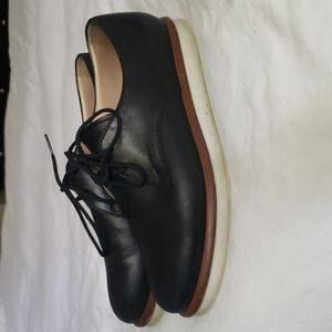 Tod's black leather shoes